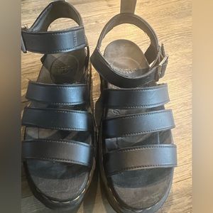 Lightly worn, some light fraying that just comes off on straps. Runs wide.